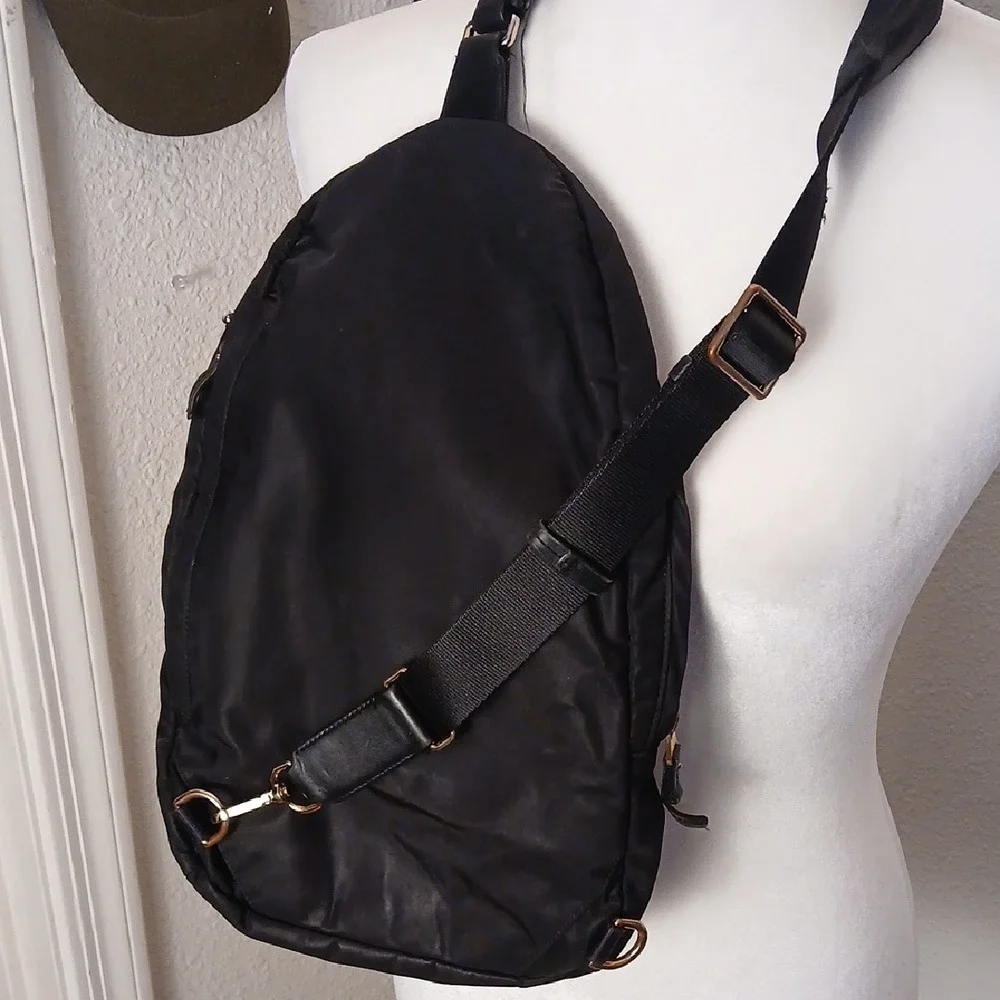 Tumi Black Belt Bag with Gold Accents